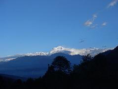 601 Dhaulagiri Sunrise From Chitre I had a great view of sunrise on Dhaulagiri from the dining room window at the New Dhaulagiri Hotel in Chitre (2420m). This view is basically the same as that from the famous Poon Hill.